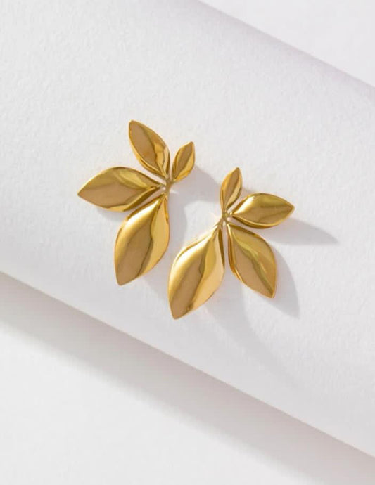 Mini Leaf Golden Stud Earrings .